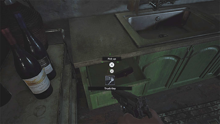 Nowy cel misji to wydostanie się z garażu płonącego budynku - Resident Evil Village: Dom Luizy/Luizas House - solucja, opis przejścia - Resident Evil Village - poradnik do gry