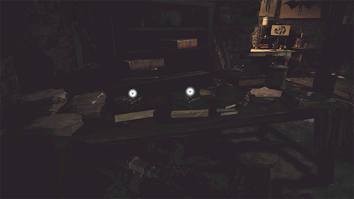 Obie księgi leżą obok siebie - dotyczą one Moreau i Lady Dimitrescu - Resident Evil Village: Finał, płonąca wioska - Akta (Files), lista - Resident Evil Village - poradnik do gry