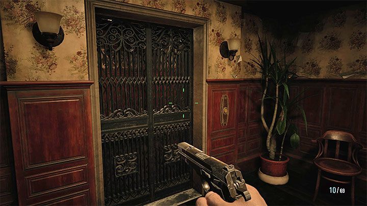 Za drzwiami znajduje się winda i po odbyciu podróży nią dotrzecie do Domu Beneviento sąsiadującego z wodospadem - Resident Evil Village: Dotarcie do domu władczyni lalek - solucja - Resident Evil Village - poradnik do gry