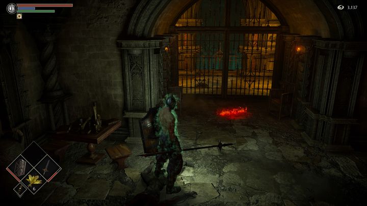 Idąc dalej, napotkacie większe drzwi blisko oświetlonego pomieszczenia - Demons Souls Remake: Więzienie Nadziei (3-1) - solucja, opis przejścia - Demons Souls Remake - poradnik do gry