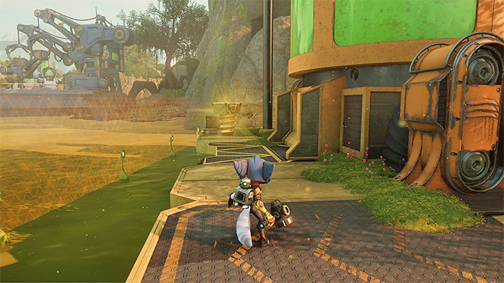 Śrubkę możecie znaleźć na tyłach platformy zlokalizowanej na wschód od kryjówki Rivet - Ratchet & Clank Rift Apart: Sargasso - znajdźki, lista wszystkich, mapa - Ratchet & Clank Rift Apart - poradnik do gry