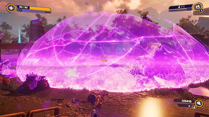Działanie broni ŻUBR polega na tworzeniu szczelin do innych wymiarów, przez które mogą wpadać ogromne (losowe) obiekty - Ratchet & Clank Rift Apart: ŻUBR/RYNO, broń ostateczna - lista szpiegobotów - Ratchet & Clank Rift Apart - poradnik do gry