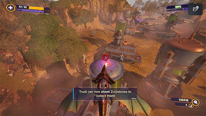 Po odnalezieniu 45 z 60 zurpników otrzymacie informację o odblokowaniu dostępu do plucia kulami ognia przez Trudi (Fireballs) - Ratchet & Clank Rift Apart: Powrót na Sargasso, Trudi - solucja, opis przejścia - Ratchet & Clank Rift Apart - poradnik do gry