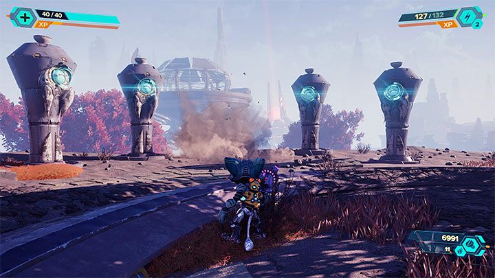 Kapliczka zlokalizowana jest w południowej części pustkowi - Ratchet & Clank Rift Apart: Zdobycie wiedzy lombaków - solucja, kapliczki - Ratchet & Clank Rift Apart - poradnik do gry
