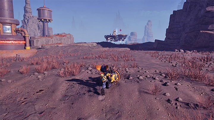 Znacznik kapliczki jest na północnym krańcu mapy okolicy - Ratchet & Clank Rift Apart: Zdobycie wiedzy lombaków - solucja, kapliczki - Ratchet & Clank Rift Apart - poradnik do gry