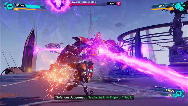 Podczas walk starajcie się szukać okazji do ostrzeliwania odsłoniętych rdzeni bossów zainstalowanych na ich klatkach piersiowych - Ratchet & Clank Rift Apart: Dowódcy inwazji, Savali - jak pokonać? - Ratchet & Clank Rift Apart - poradnik do gry