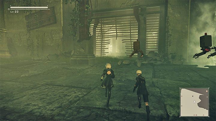 Po wygranej walce załączy się cut-scenka z udziałem głowy maszyny, która przetoczy się w stronę zabarykadowanego przejścia i eksploduje - NieR Automata: 6 Rozdział, Route A - solucja, opis przejścia - NieR Automata - poradnik do gry