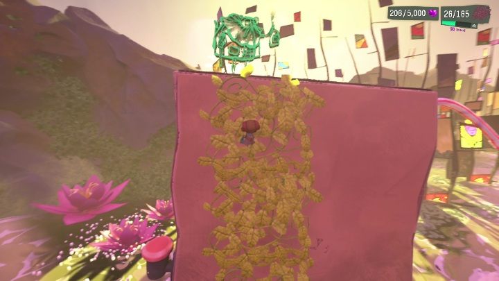 Będąc już w kolejnej części lokacji musicie doskoczyć na liście, które wiszą na różowej ścianie - Psychonauts 2: Bobs Bottles - solucja, opis przejścia - Psychonauts 2 - poradnik do gry
