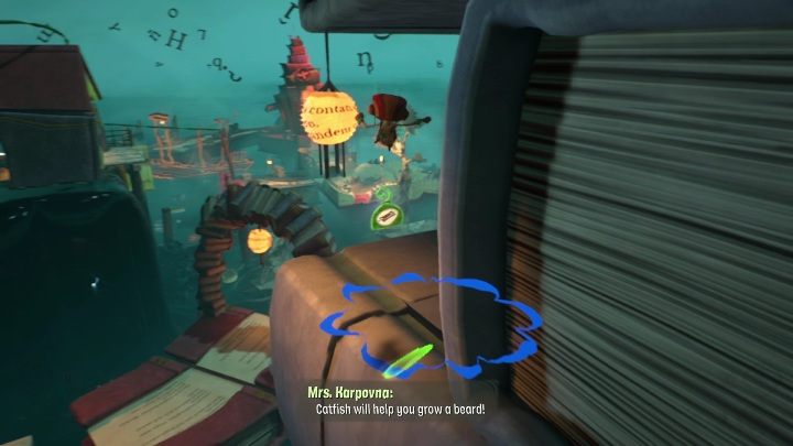 Do tej zawieszki doskoczycie, gdy przebrniecie przez okładki, które przyczepione są do ogromnego stosu książek - Psychonauts 2: Emotional Baggage, Cassies Collection - gdzie znaleźć? - Psychonauts 2 - poradnik do gry