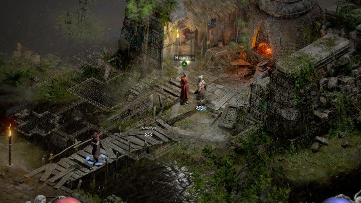 Spotkanego wcześniej w dokach handlarza Hratli znajdziecie teraz w jego domku, na południowym wschodzie - Diablo 2 Resurrected: Ostrze Dawnej Religii - solucja, opis przejścia - Diablo 2 Resurrected - poradnik do gry