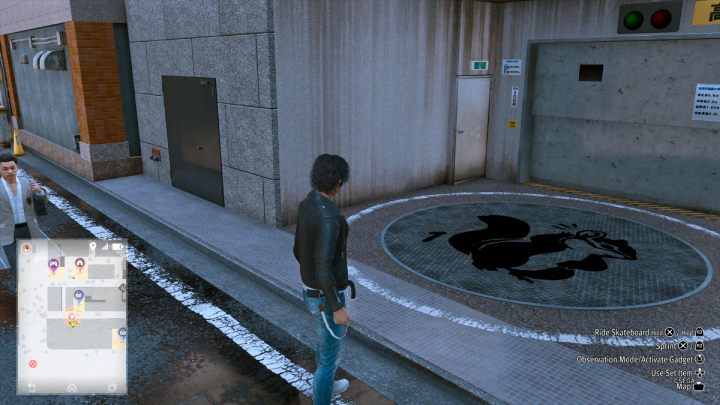 54 obrazek znajduje się na ziemi przy sklepie Ebisu Pawn - Lost Judgment: Squirrel search Showa Street - wszystkie wiewiórki, mapa - Lost Judgment - poradnik do gry