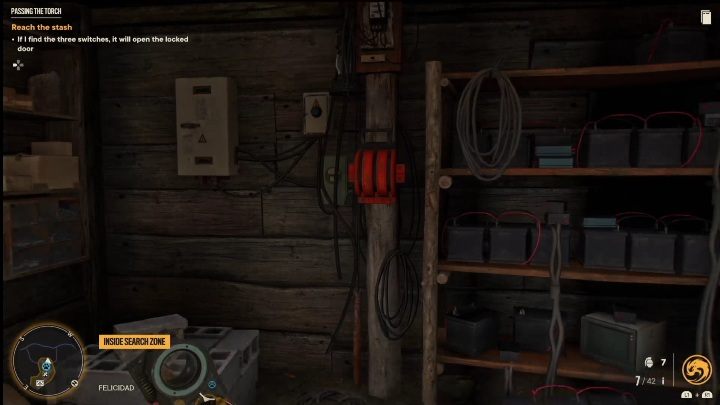 Kolejny przełącznik znajduje się w drewnianym budynku, który może służyć za pomieszczenie gospodarcze - Far Cry 6: Przekazanie pałeczki - Wyprawy po skarby (El Este) - Far Cry 6 - poradnik do gry
