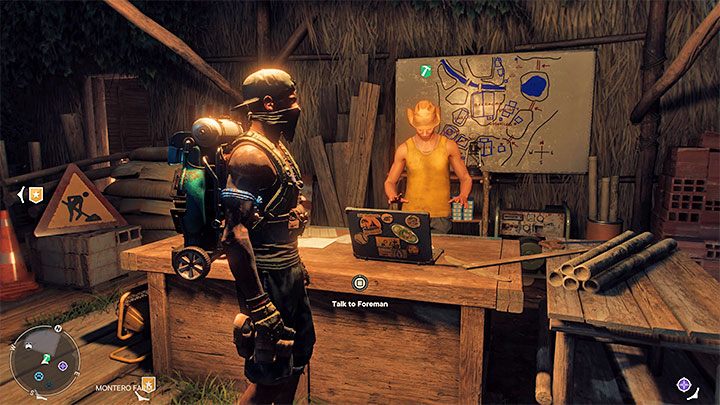 Na oddzielny opis zasługuje bardzo ważne biurko budowlane, przy którym można zagadać do brygadzisty - Far Cry 6: Obozy partyzantów i ich rozbudowa - Far Cry 6 - poradnik do gry