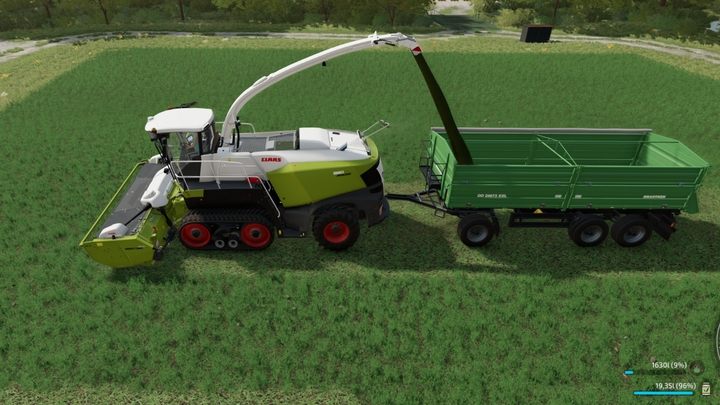 Dodatkowo silosokombajn pracuje na większym obszarze niż kosiarka z przyczepą samozbierającą przy ciągniku, oraz z większą szybkością - Farming Simulator 22: Sianie i koszenie trawy - Farming Simulator 22 - poradnik do gry