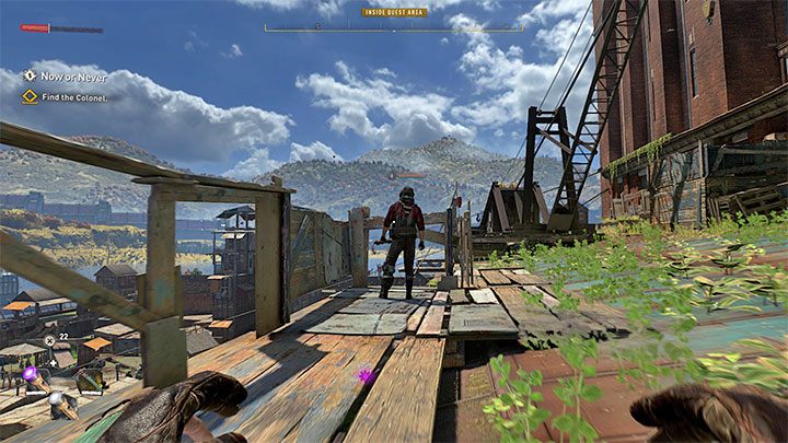 Na dachu zauważycie pojedynczego snajpera z łukiem i dla pewności dobrze byłoby go po cichu się pozbyć - Dying Light 2: Teraz albo nigdy - solucja, opis przejścia - Dying Light 2 - poradnik do gry