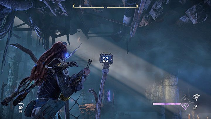 Wejdźcie na wyższy balkonik i zainteresujcie się metalowym obiektem z obrazka - musicie złapać się go z użyciem przyciągacza - Horizon Forbidden West: Wrota śmierci (Deaths Door) - solucja, opis przejścia - Horizon Forbidden West - poradnik do gry