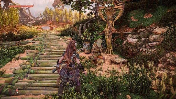 Porozmawiajcie z kobietą o imieniu Kin, która siedzi nieopodal ogniska w osadzie Pieśń Ziemi - Horizon Forbidden West: Plemię z daleka (A Tribe Apart) - solucja, opis przejścia - Horizon Forbidden West - poradnik do gry
