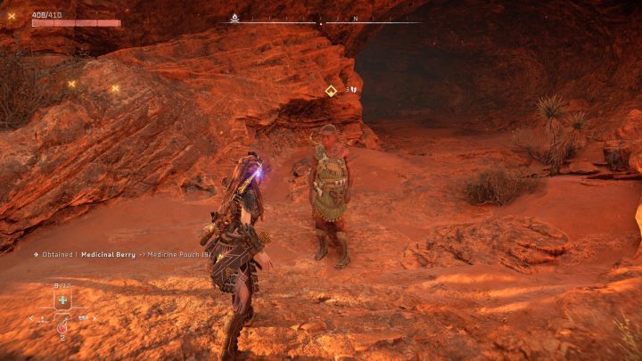 Udajcie się w wyznaczone miejsce między obozem Carja i Kamienne Echo i porozmawiajcie z mężczyzną stojącym przed jaskinią - Horizon Forbidden West: Plemię z daleka (A Tribe Apart) - solucja, opis przejścia - Horizon Forbidden West - poradnik do gry