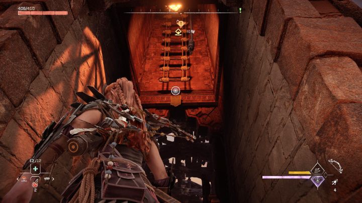 Przejdźcie na koniec pomieszczenia, przyciągnijcie się do uchwytu i wejdźcie po drabinie na górę - Horizon Forbidden West: Plemię z daleka (A Tribe Apart) - solucja, opis przejścia - Horizon Forbidden West - poradnik do gry