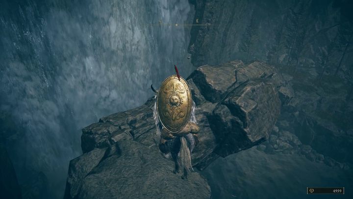 Ostrożnie zejdźcie w dół po kamiennych półkach na prawo od wodospadu - Shadow of the Erdtree: Jak dotrzeć na południowy skraj mapy? - Elden Ring - poradnik do gry