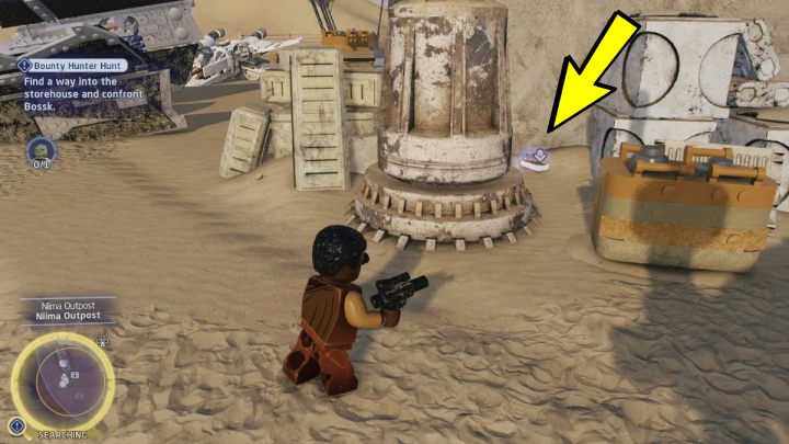 Kartę wejścia do magazynu znajdziecie przy ścianie domu - LEGO Skywalker Saga: Łowy na łowcę (Bounty Hunter Hunt) - solucja, opis przejścia - LEGO Skywalker Saga - poradnik do gry