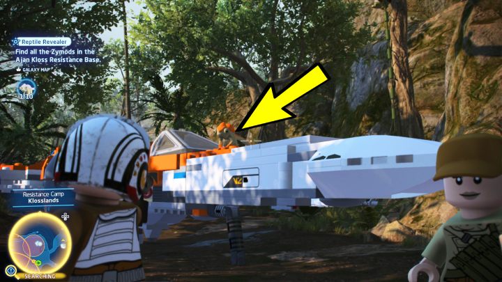 Pomarańczowy kameleon stoi na jednym ze statków - LEGO Skywalker Saga: Gonitwa za gadami (Reptile Revealer) - solucja, opis przejścia - LEGO Skywalker Saga - poradnik do gry