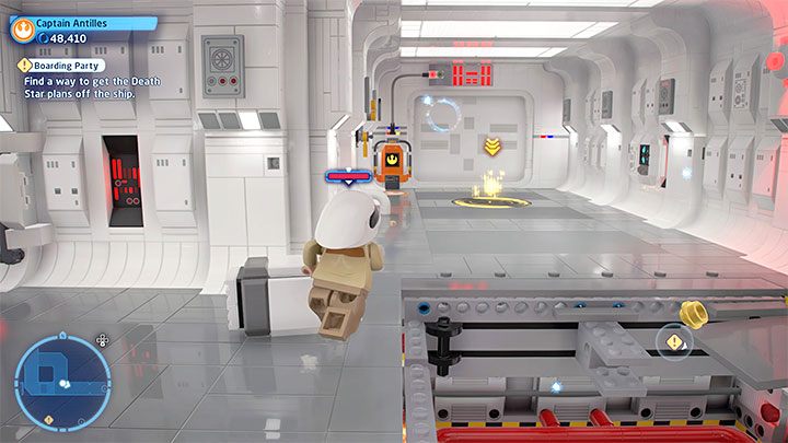 Przełączcie się na drugiego bohatera, omińcie dziurę w podłodze i dotrzyjcie do pokazanych na obrazku drzwi z terminalem - LEGO Skywalker Saga: Ambasadorze, to abordaż (Boarding Party) - solucja, opis przejścia - LEGO Skywalker Saga - poradnik do gry