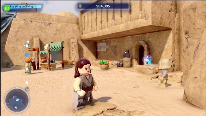Ta znajdźka schowana jest w domu, którego wejście jest zamknięte na specjalny mechanizm - LEGO Star Wars The Skywalker Saga: Mos Eisley - lista wszystkich łamigłówek - LEGO Skywalker Saga - poradnik do gry