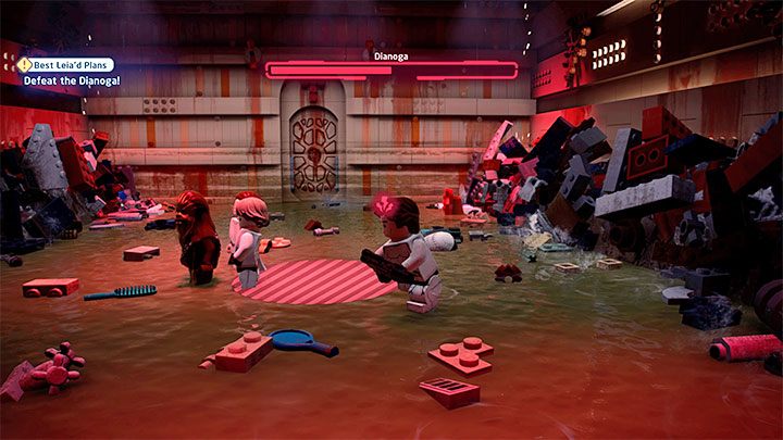 W dalszej części pojedynku unikajcie czerwonych okręgów na ziemi symbolizujących ponowne próby złapania bohatera - LEGO Skywalker Saga: Dianoga - boss, jak pokonać? - LEGO Skywalker Saga - poradnik do gry