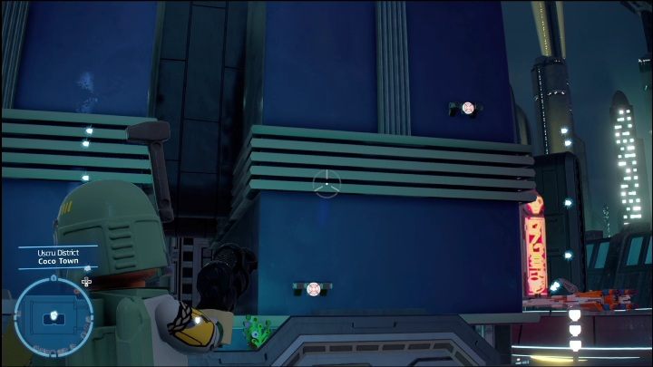 Klocek został schowany w niewielkiej wnęce zaraz obok sklepu - LEGO Skywalker Saga: Dzielnica Uscru - lista wszystkich łamigłówek - LEGO Skywalker Saga - poradnik do gry