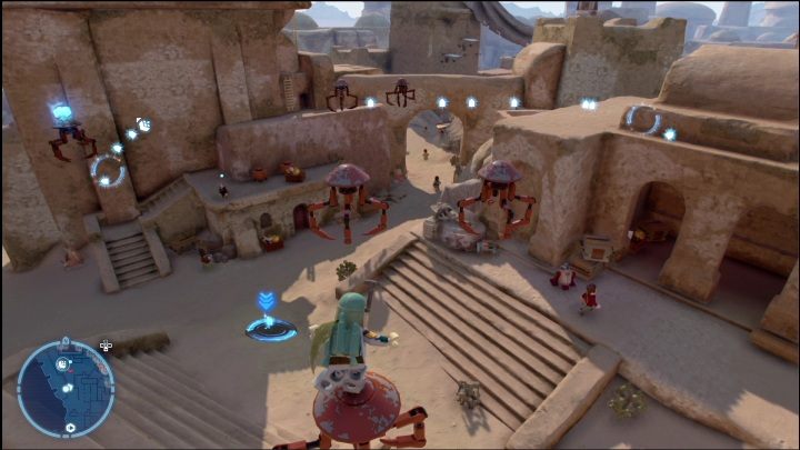 Ten klocek Kyber leży na jednym z droidów latających nad powierzchnią - LEGO Skywalker Saga: Mos Espa - lista wszystkich łamigłówek - LEGO Skywalker Saga - poradnik do gry