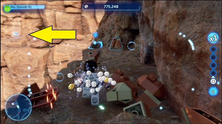 Tę znajdźkę zdobędziecie idąc po półkach skalnych, wokół okrągłej góry - LEGO Skywalker Saga: Pustynia Jundlandii- lista wszystkich łamigłówek - LEGO Skywalker Saga - poradnik do gry
