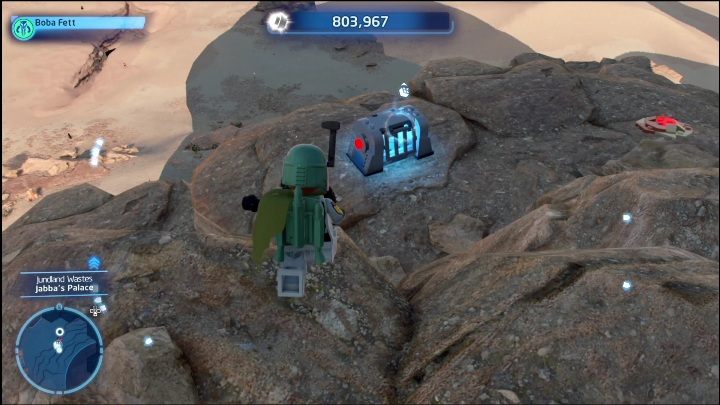 Ten klocek zamknięty jest w skrzyni, żeby go zdobyć musicie uruchomić 4 przyciski w czasie mniejszym niż 30 sekund - LEGO Skywalker Saga: Pustynia Jundlandii- lista wszystkich łamigłówek - LEGO Skywalker Saga - poradnik do gry