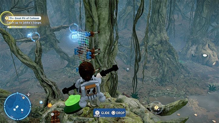Klocek lewituje przy pionowych platformach do rozwieszania siatek - pokazuje je powyższy obrazek - LEGO Skywalker Saga: Bagno smokowęża - lista wszystkich łamigłówek - LEGO Skywalker Saga - poradnik do gry