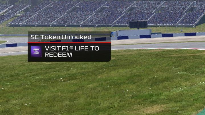 Gra informuje o zdobyciu każdego nowego tokena (przykładowy komunikat na obrazku) - F1 22: Supersamochody i wyzwania - Gorące okrążenia (Pirelli Hot Laps) - F1 22 - poradnik do gry