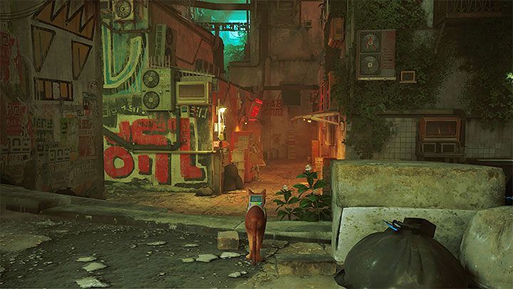 Rozpocznijcie przed garażem ze Strażnikiem, obróćcie się i wyruszcie prosto w stronę alejki z powyższego obrazka - Stray: Mapa slumsów (The Slums) - czy jest dostępna w grze? - Stray - poradnik do gry