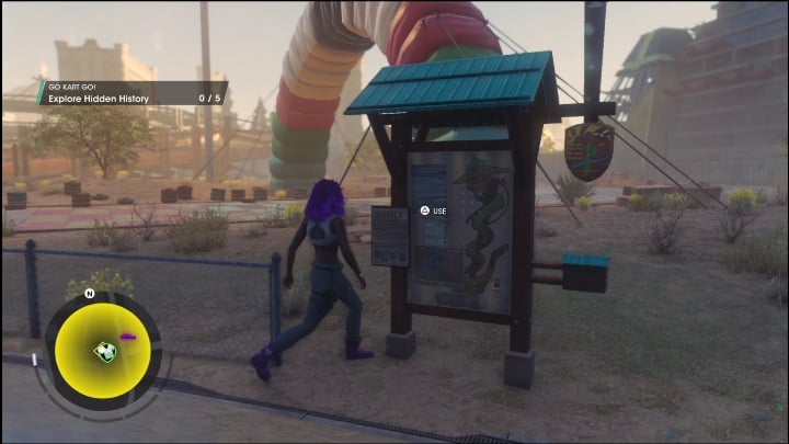 Aktywność Tajna historia rozpocznie się, gdy klikniecie przycisk na tablicy startowej, zaraz przed punktem turystycznym - Saints Row 2022: Odkrycia (El Dorado) - lista i opisy aktywności - Saints Row - poradnik do gry