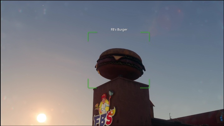 W tym zadaniu należy wykonać zdjęcie figury cheeseburgera postawionego na dachu baru szybkiej obsługi FBS - Saints Row 2022: Odkrycia (Wschodnie Flats) - lista i opisy aktywności - Saints Row - poradnik do gry