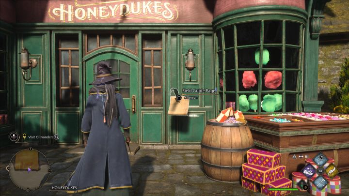Następna strona jest przed wejściem do sklepu ze słodyczami - Hogwarts Legacy: Strony przewodnika (Field Guide Pages) część 2 - Hogsmeade - Hogwarts Legacy - poradnik do gry