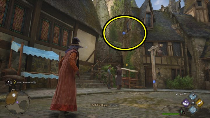 Następna fruwająca strona Flying Guide Page #11 (Hogsmeade) jest za Pubem pod Trzema Miotłami (The Three Broomsticks) w centrum wioski - Hogwarts Legacy: Strony przewodnika (Field Guide Pages) część 2 - Hogsmeade - Hogwarts Legacy - poradnik do gry