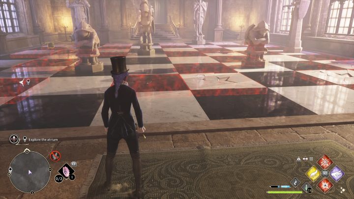 W pokoju z szachami użyjcie zaklęcia Revelio i unikajcie przechodzenia przez podświetlone na czerwono pola - Hogwarts Legacy: Jak zbadać Atrium w queście Pilnowanie swojego nosa (Minding Your Own Business)? - Hogwarts Legacy - poradnik do gry