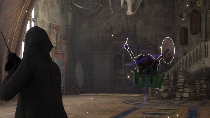 W trakcie lekcji nauczycie się zaklęcia Levioso - zaliczcie poznaną mini-grę z podążania kursorem po widocznej na ekranie trasie (po drodze wciskajcie przycisk X / A) - Hogwarts Legacy: Zajęcia z obrony przed czarną magią (Defence Against the Dark Arts Class) - Hogwarts Legacy - poradnik do gry
