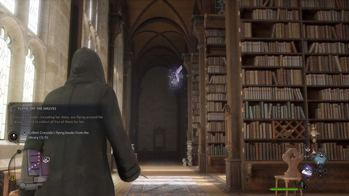 Użyjcie kompasu, by zlokalizować wejście do dwupoziomowej biblioteki - możecie używać zakręcanych schodów do podróżowania między jej piętrami - Hogwarts Legacy: Skrzydlate słowa (Flying Off the Shelves) - Hogwarts Legacy - poradnik do gry