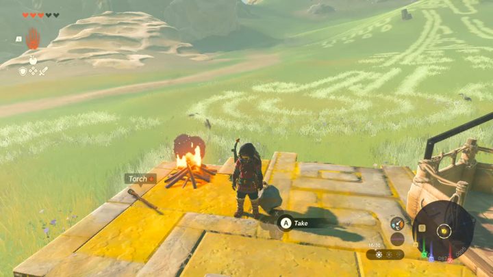 Podnieście balon leżący na ziemi przy pomocy umiejętności Ultrahand i przymocujcie go do drewnianej platformy obok Impy - Zelda TotK: Impa and the Geoglyphs - opis przejścia - Zelda Tears of the Kingdom - poradnik do gry