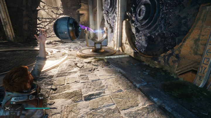 Możecie już zabrać kulę, przejść z nią obok skrzyni blokującej drzwi i umieścić kulę we wzmacniaczu kul z obrazka - Jedi Survivor: Zagadki ze sprzęgami kul w Zniszczonej osadzie - Star Wars Jedi Survivor - poradnik do gry