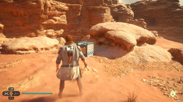 Skrzynia jest na małym wzgórzu sąsiadującym z jaskinią potworów, w której znaleźliście 3 poprzednie sekrety - Jedi Survivor: Suche równiny z planety Jedha - lista sekretów - Star Wars Jedi Survivor - poradnik do gry