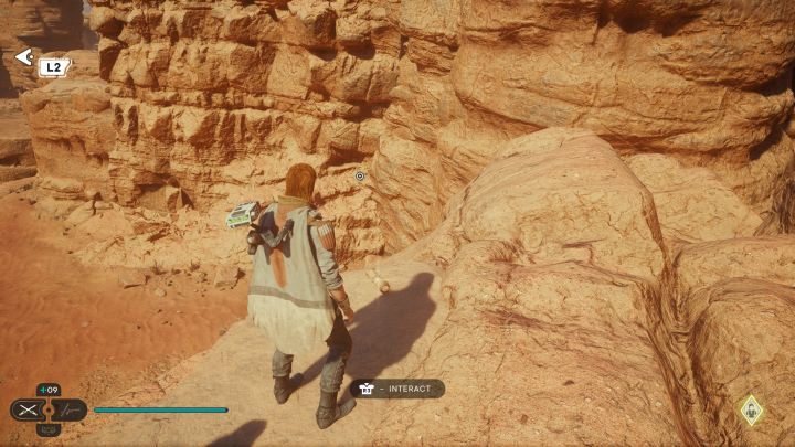 Zwój z Jedhy jest na wysokiej skalnej półce niedaleko punktu medytacji i miejsca, w którym Skoova łowi ryby - Jedi Survivor: Suche równiny z planety Jedha - lista sekretów - Star Wars Jedi Survivor - poradnik do gry