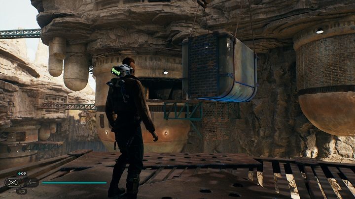 Po wyjściu z małej skrytki udajcie się na wprost, do kontenera zawieszonego w górze - Jedi Survivor: Osada Bygone - lista sekretów - Star Wars Jedi Survivor - poradnik do gry