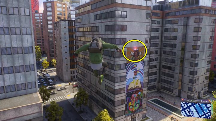 Ten Spider Bot jest na najwyższym billboardzie na ścianie budynku - Spider Man 2: Wszystkie Spider Boty lokacje - Spider Man 2 - poradnik do gry