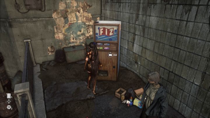 Wejdźcie w interakcję z automatem z napojami w alejce w centralnej części miasta - Stellar Blade: Wszystkie puszki - Stellar Blade - poradnik do gry